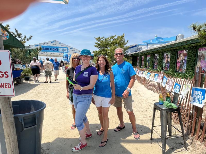 Parrotheads having fun in the sun are (l-r) Becky Dressler, Lori Brown, Becky Knowles and Rob Knowles.